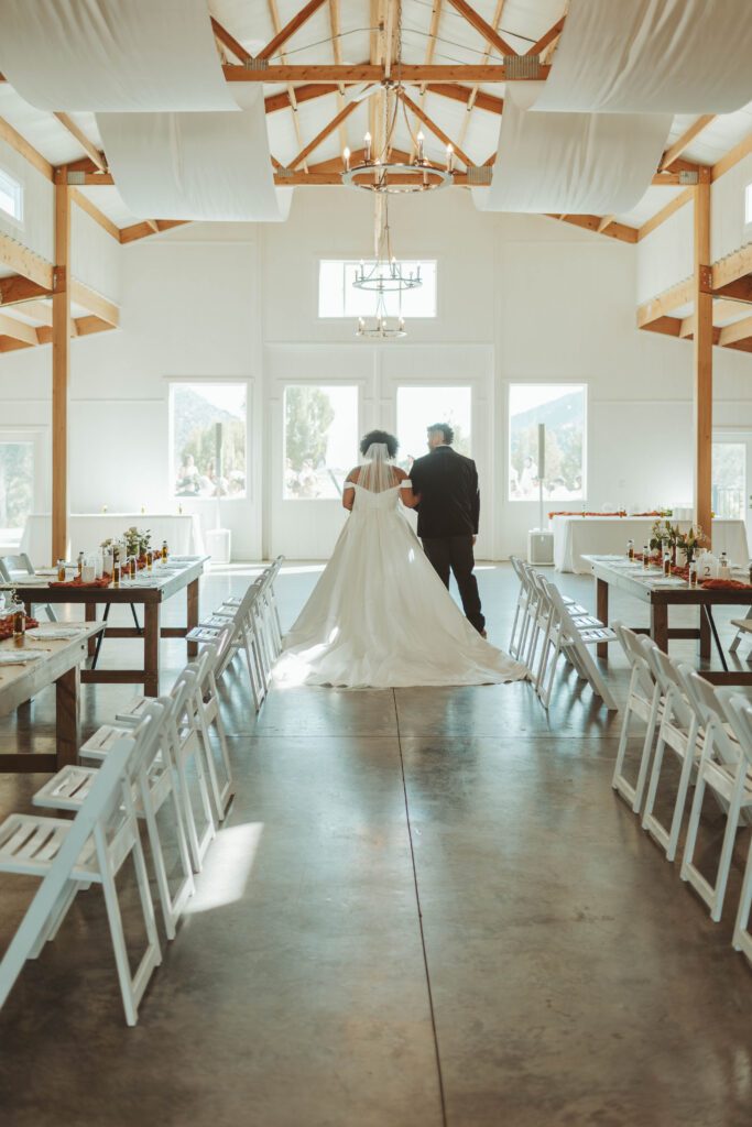 Bride waiting to walk down the aisle at her Colorado Wedding Ceremony at Vista View